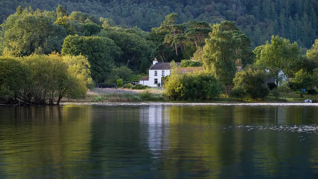 Strandshag Bay on Derwentwater, in the Lake District, with fells rising behind the water.